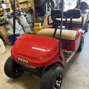 FLAME RED 2013 EZGO TXT GOLF CART NEW US BATTERIES & NEW WHEELS / TIRES , HAS FUNCTIONING LIGHTS AND BATTERY GAUGE. RUNS/ DRIVES GOOD !