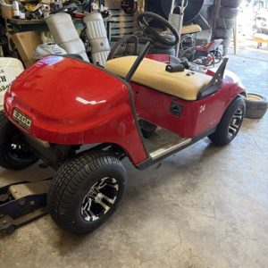 FLAME RED 2013 EZGO TXT GOLF CART NEW US BATTERIES & NEW WHEELS / TIRES , HAS FUNCTIONING LIGHTS AND BATTERY GAUGE. RUNS/ DRIVES GOOD !
